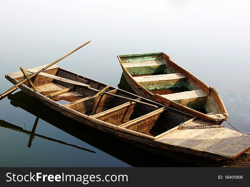 Two rowing baots parking in lake. Two rowing baots parking in lake