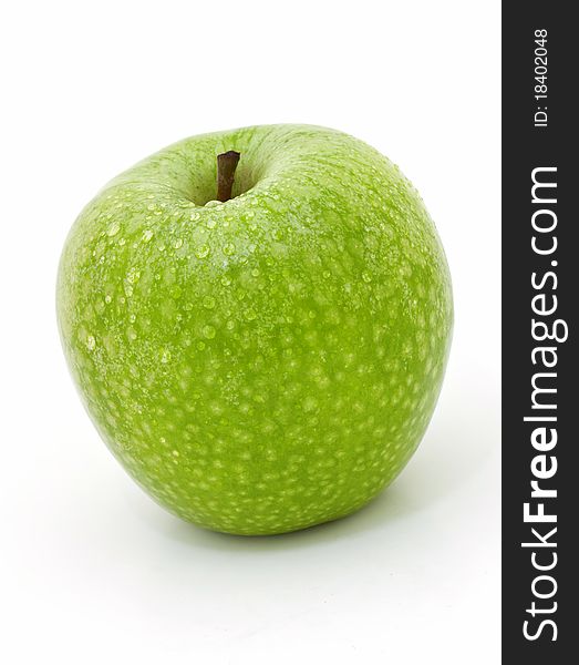 Isolated fresh green apple with drop