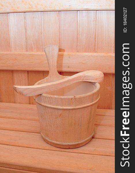 A portrait of sauna bucket made by a natural wood