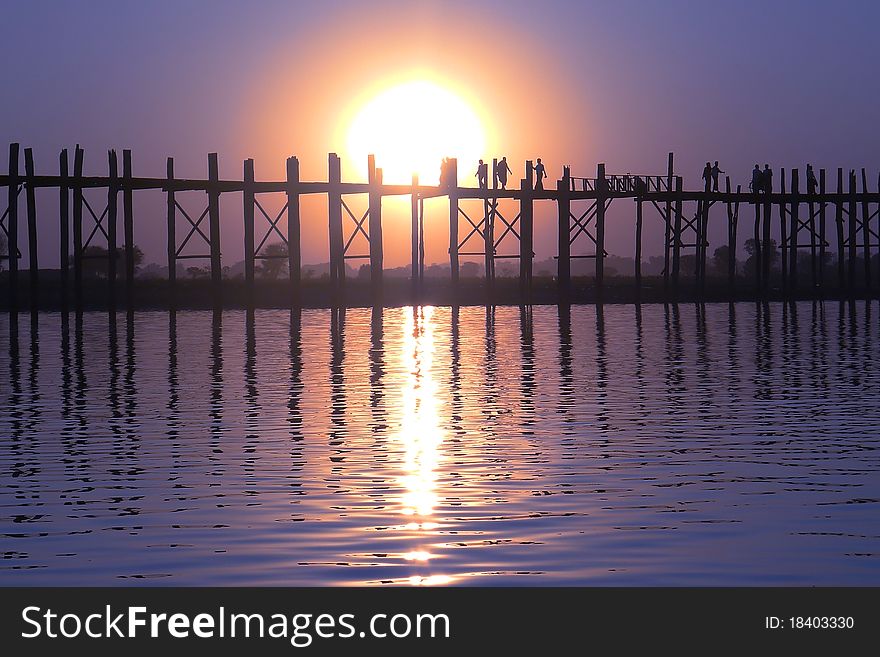 Landscape Of An Old Wooden Bridge At Sunset