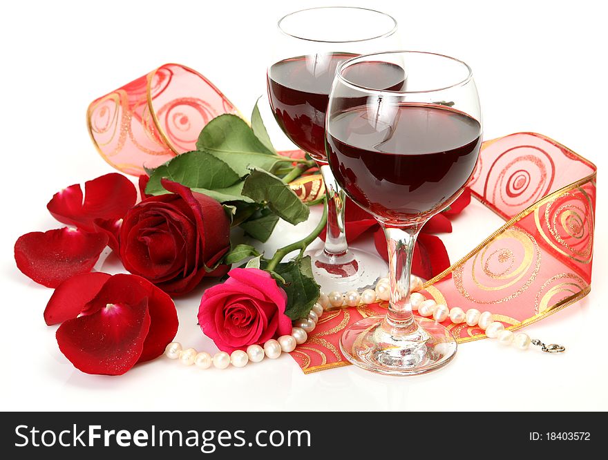 Wine and roses on a white background. Wine and roses on a white background