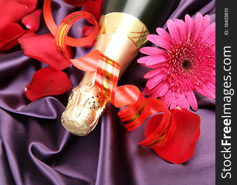 Wine and flower on a silk fabric