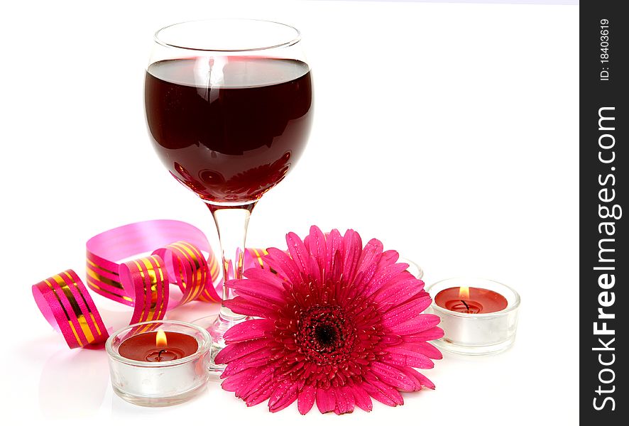 Wine and flower on a white background