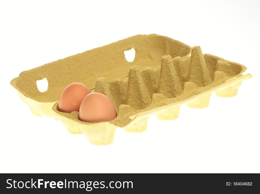 Eggs in box isolated on a white background