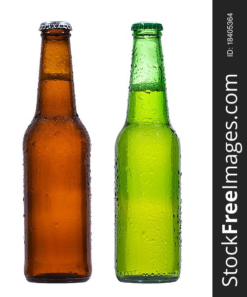 Bottles of beer with water drops on white background