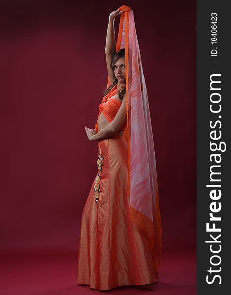 Young elegance woman in a dress dance with a shawl. Young elegance woman in a dress dance with a shawl