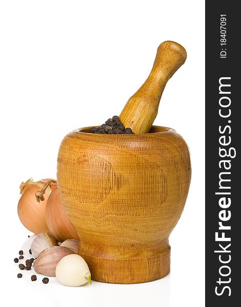 Garlic, Onion And Pepper In Mortar And Pestle