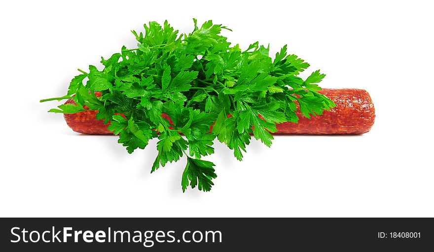 Single sausage on a white background with green parsley. Single sausage on a white background with green parsley.