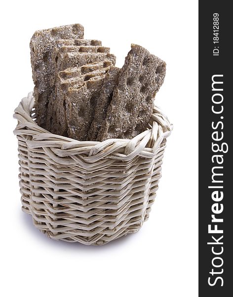 Stack of brown crisp bread in the basket