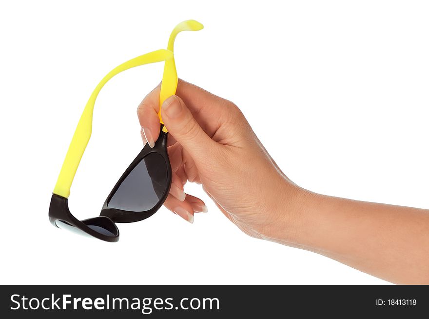 Woman holding stylish and trendy sunglasses in the hand for eyes protection. Woman holding stylish and trendy sunglasses in the hand for eyes protection