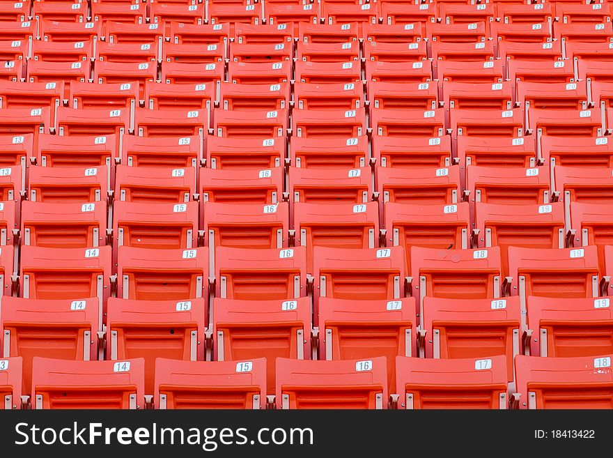 Bright red patten stadium seats. Bright red patten stadium seats