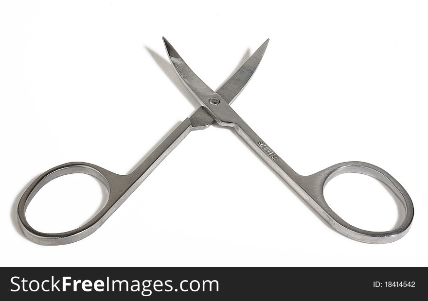 Steel scissors for cutting the nails. Curved blade. Steel scissors for cutting the nails. Curved blade.