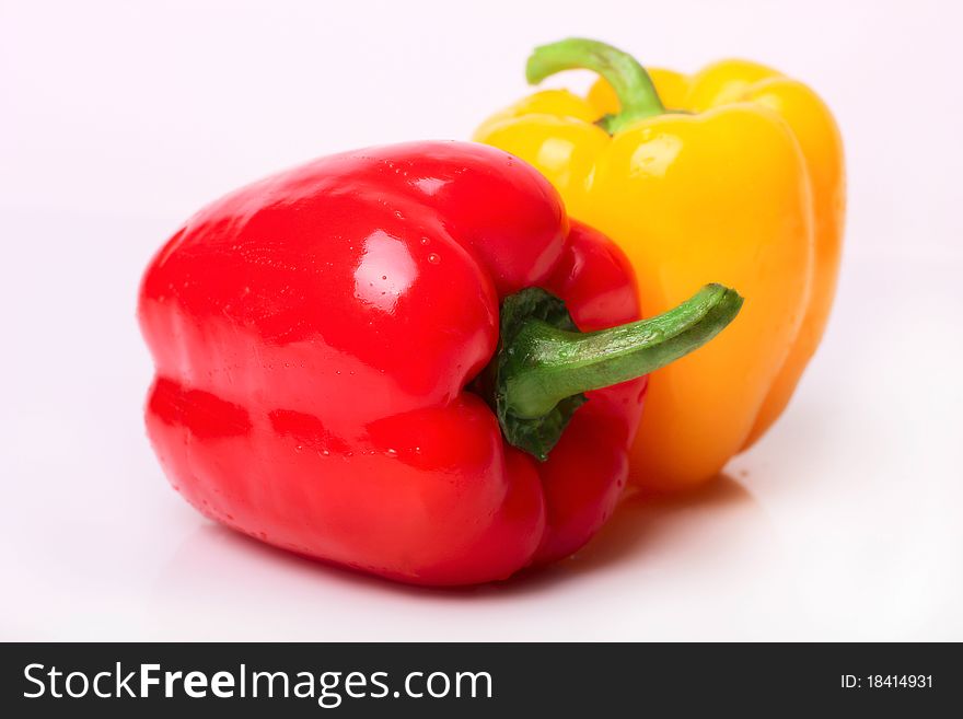 Two bell peppers isolated on the white