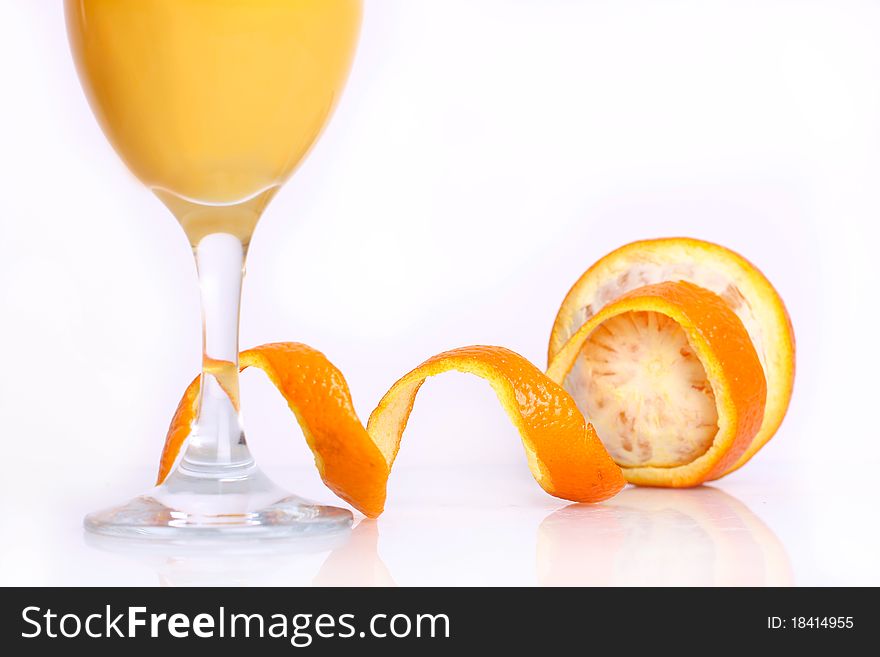 Orange with juice isolated on the white