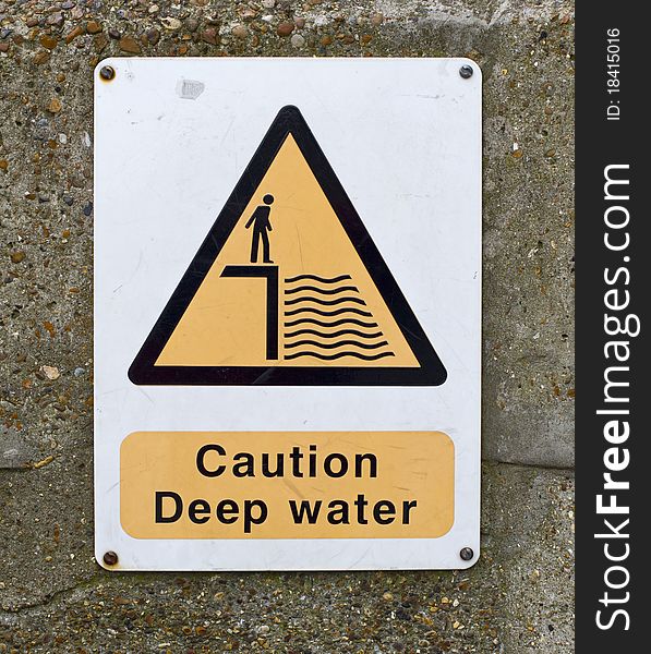 Caution Deep Water Sign On Wall