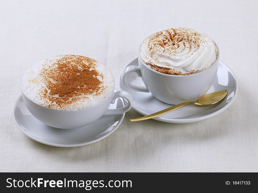 Two cups of coffee drinks - closeup