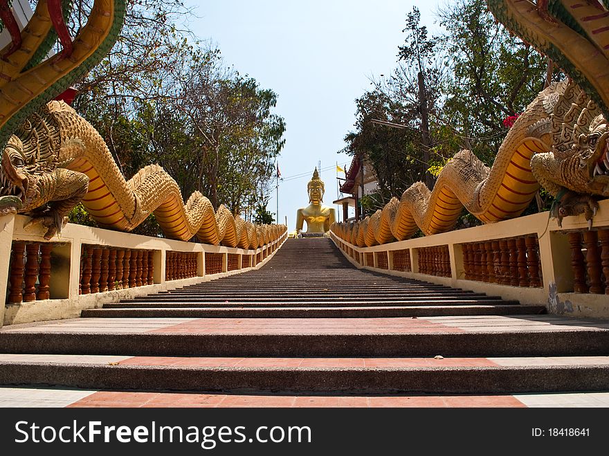 Long stairs to Buddha Statue in Thailand.