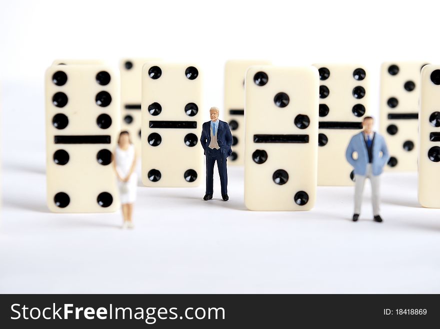 Some miniature people on domino cubes
