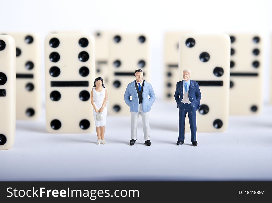 Some miniature people on domino cubes