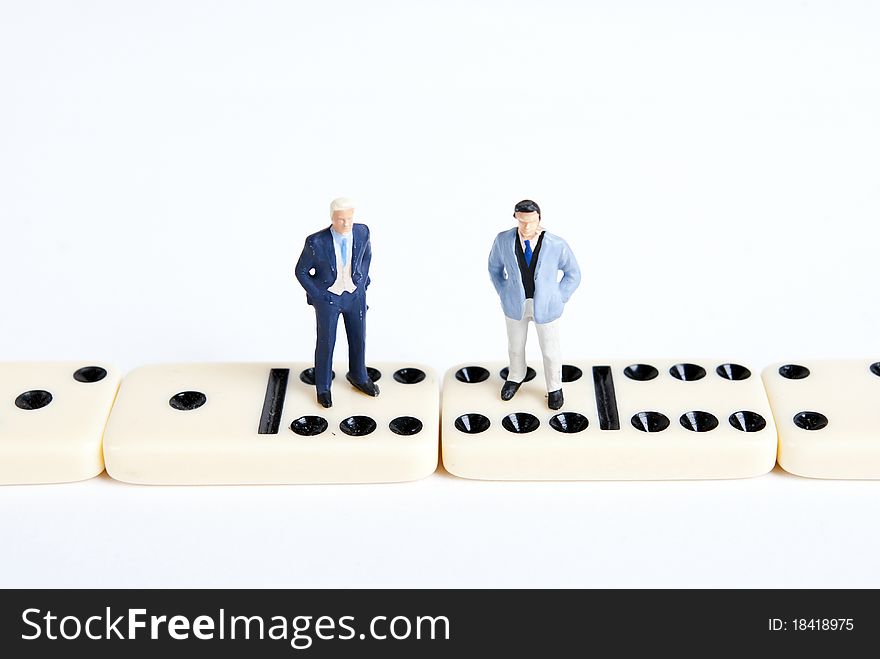 Some miniature people on domino cubes