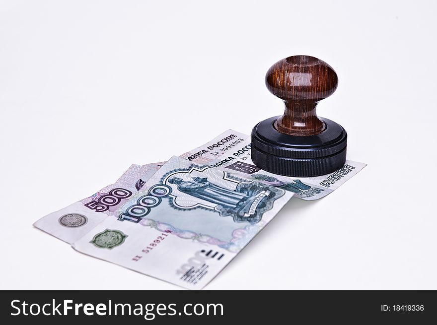 Stamp and money on a light background
