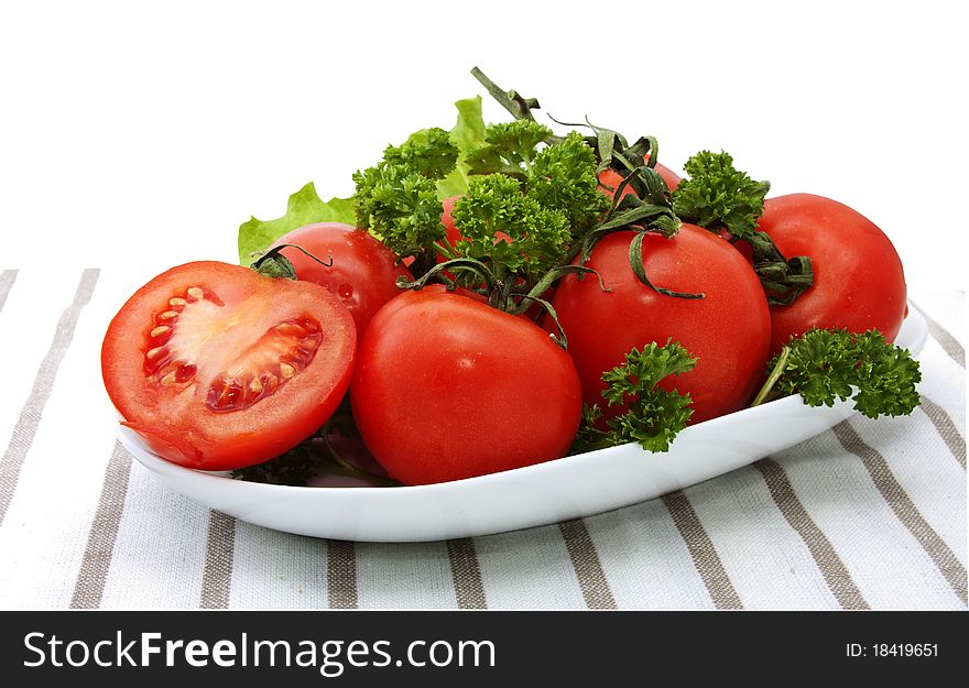 Bunch of tomatoes with parsley