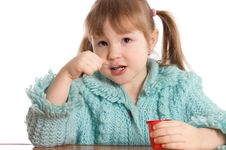 The Little Girl Eats Yoghurt Stock Photo The Little Girl Eats Yoghurt Stock Photo
