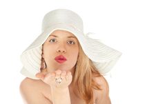 Blond Girl With Hat Sends Kiss Royalty Free Stock Image