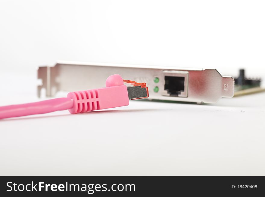 Ethernet card with pink ethernetcable ,connected, concept of networking