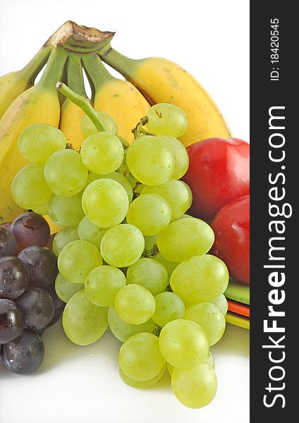 Green grape and fruit on white background. Green grape and fruit on white background