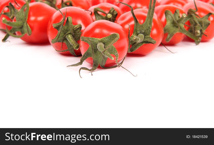 Studio photo of cherry tomatoes, isolated on white background