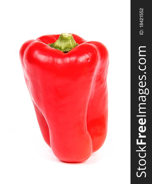 Studio photo of fresh red pepper, isolated on white background