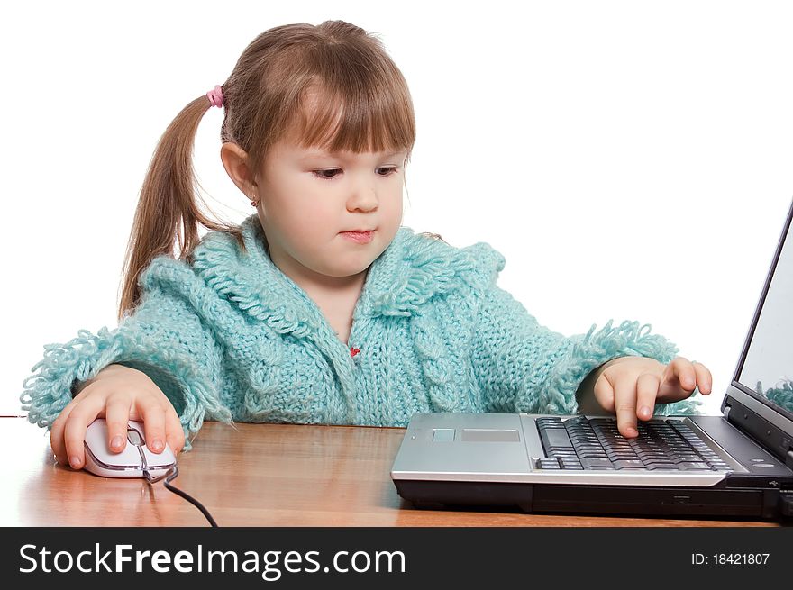 The little girl at the computer