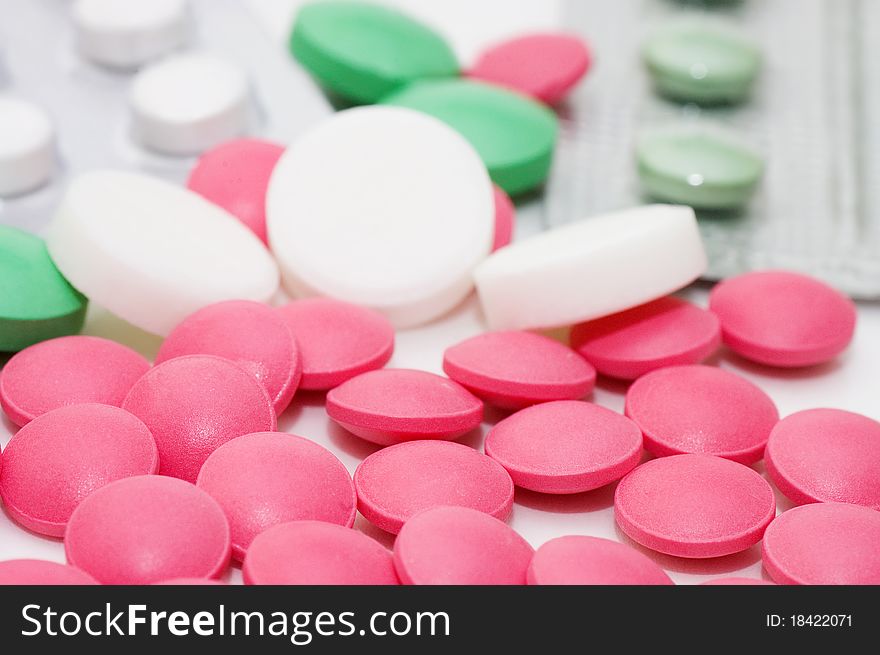 Packs of pills - abstract medical background close up