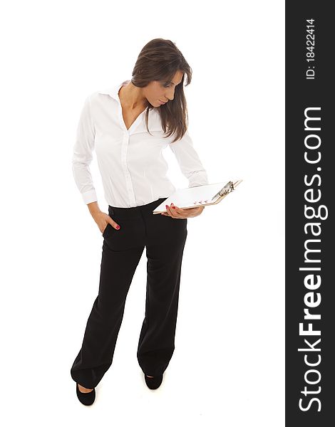 Business Woman in white blouselooking at a clipboard