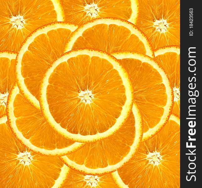 Fresh bright orange slices background. Fresh bright orange slices background