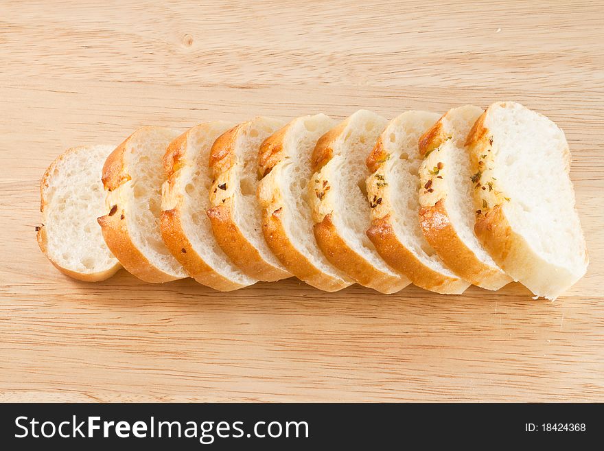 Stack of Garlic bread on wood cut board