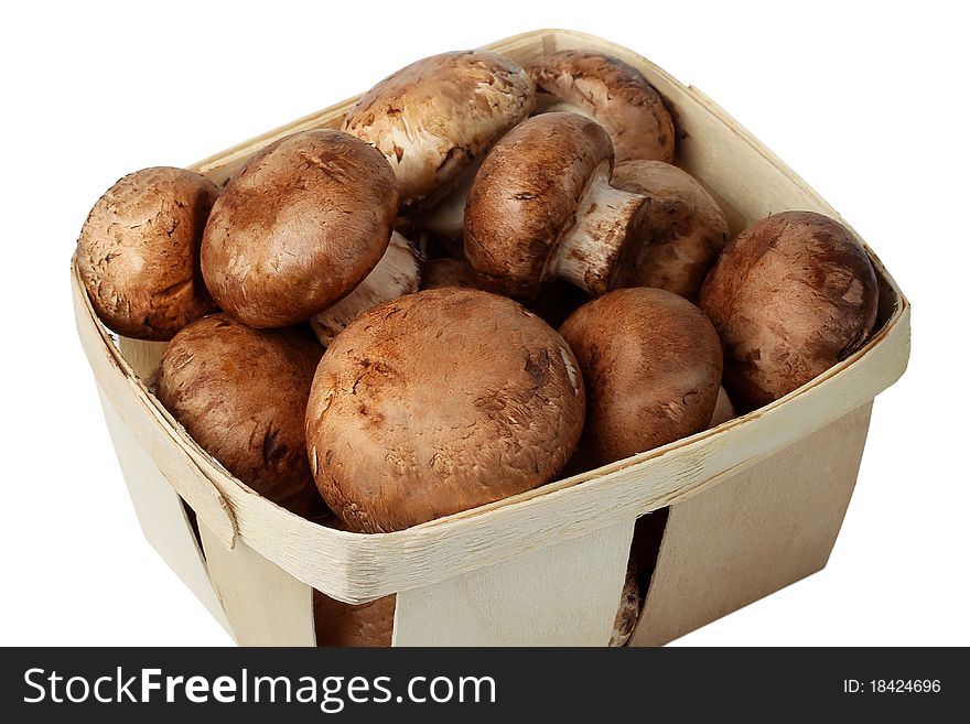 Field mushrooms in a wicker basket