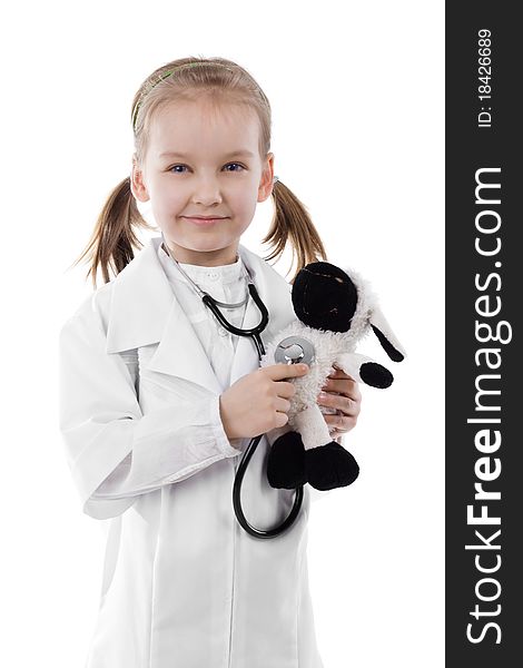 Little girl as a doctor on white