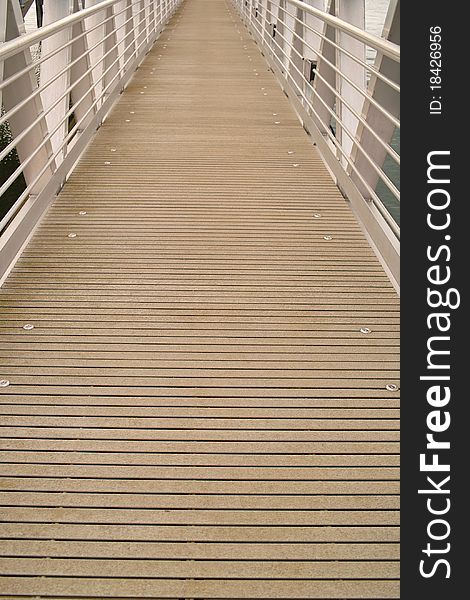 Vertical view of a dock ramp with metal railings. Vertical view of a dock ramp with metal railings.