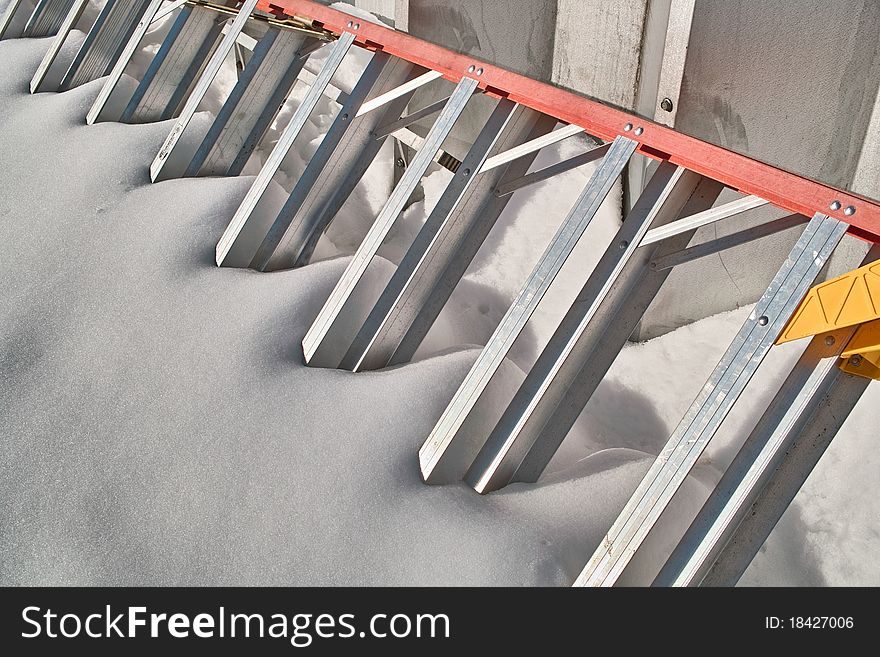 Abstract of ladder in snow.