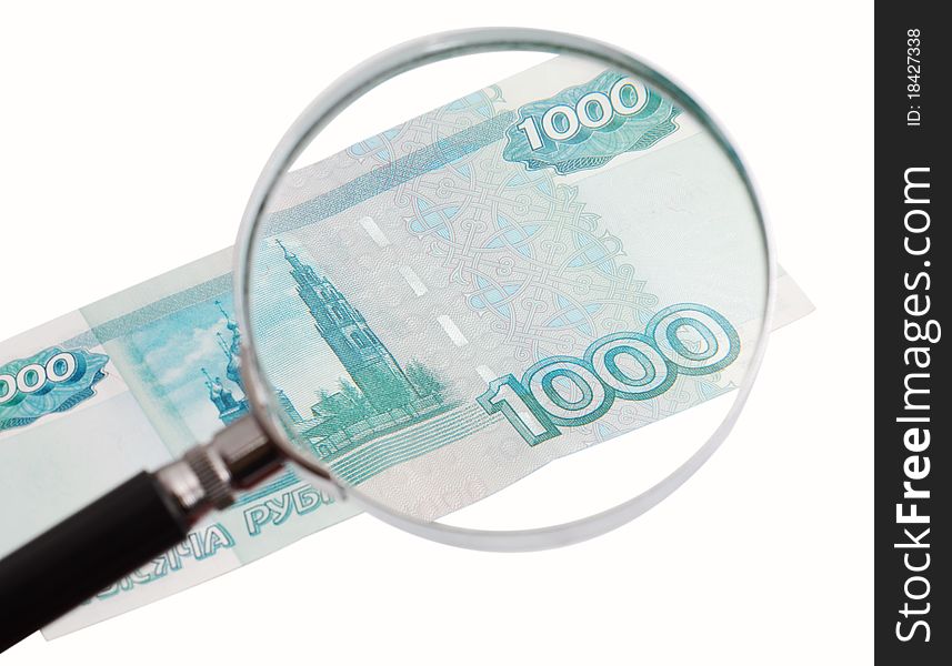 Paper money increased magnifying glass