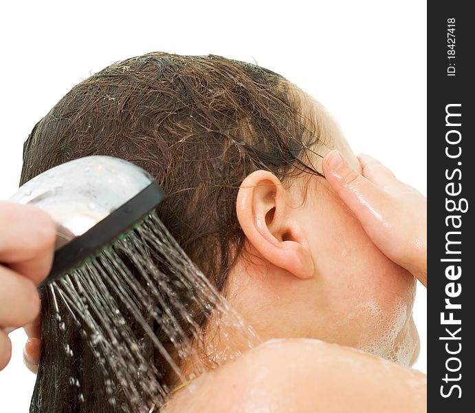 Little girl washes her head, isolation