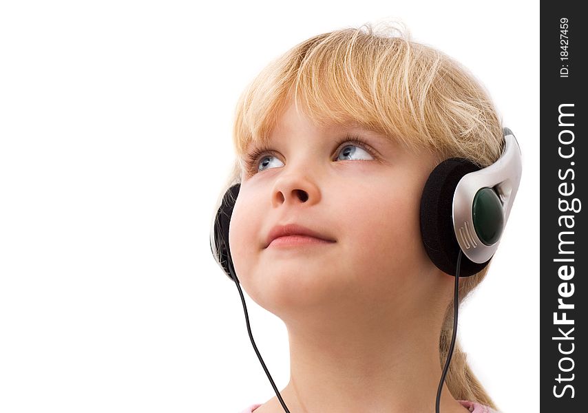 Little girl in headphones, white background