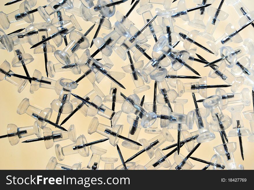 Push pins on a light table