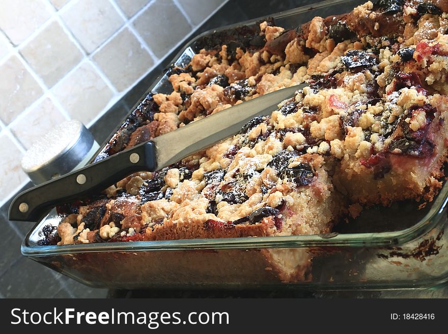 Freshly baked plum and crumble cake. Freshly baked plum and crumble cake