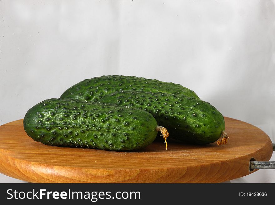 Fresh green cucumber isolated on white.