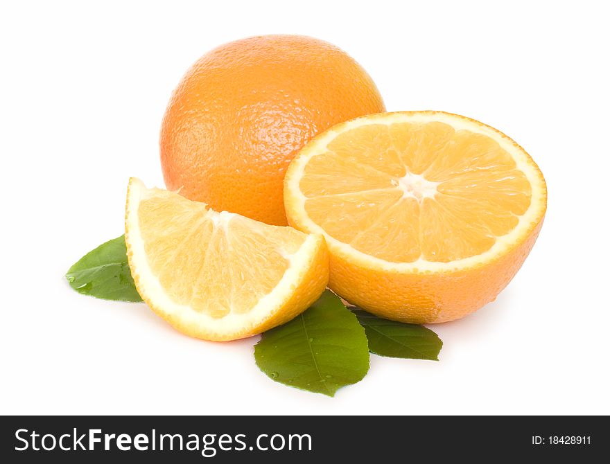 Orange half and slice with leaves