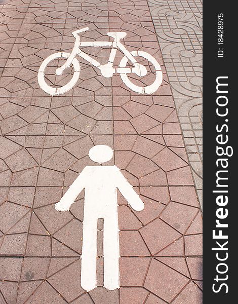 Pedestrian and bicycle symbols.