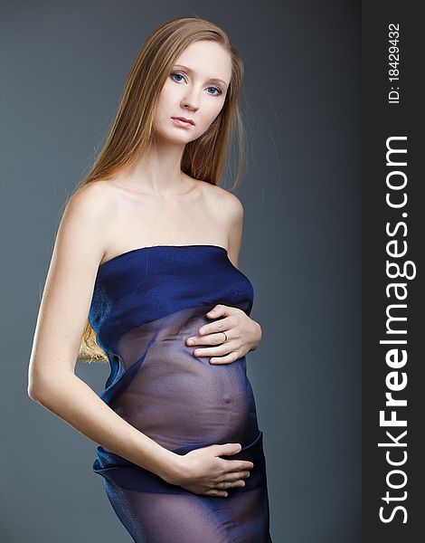 A Beauty Pregnant Woman With Cloth